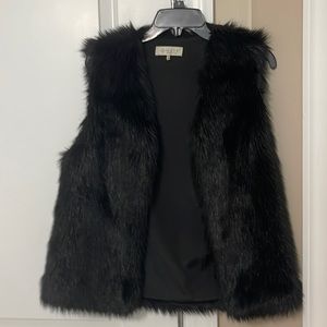 Black faux fur vest